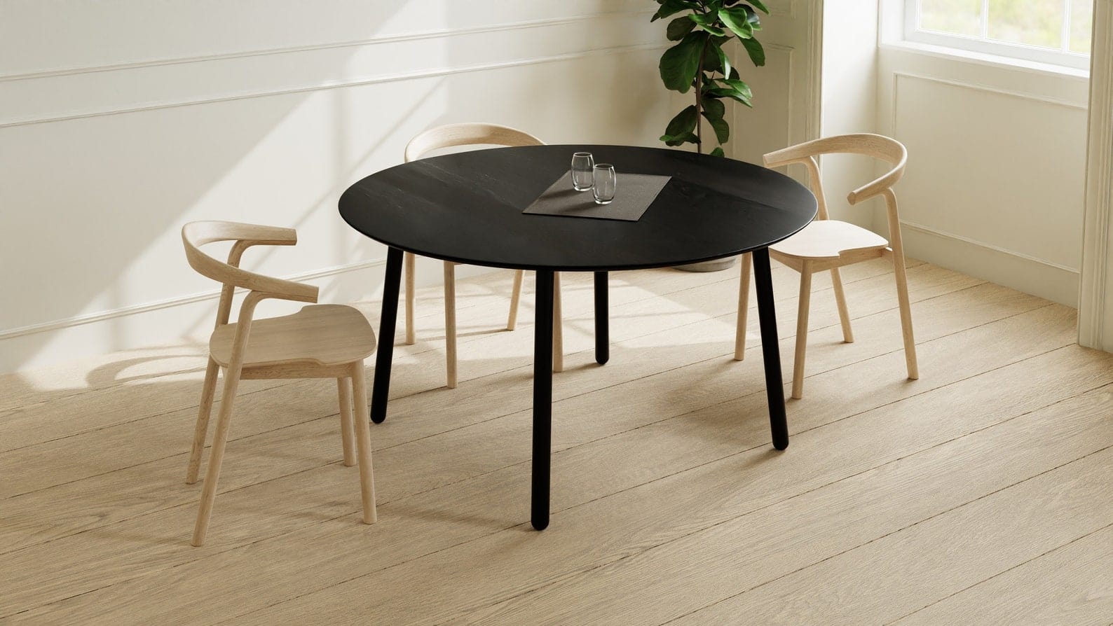 Round Dining Table in Black Oak on Black Steel Danish Legs, 4-6 seater / EARTH Collection