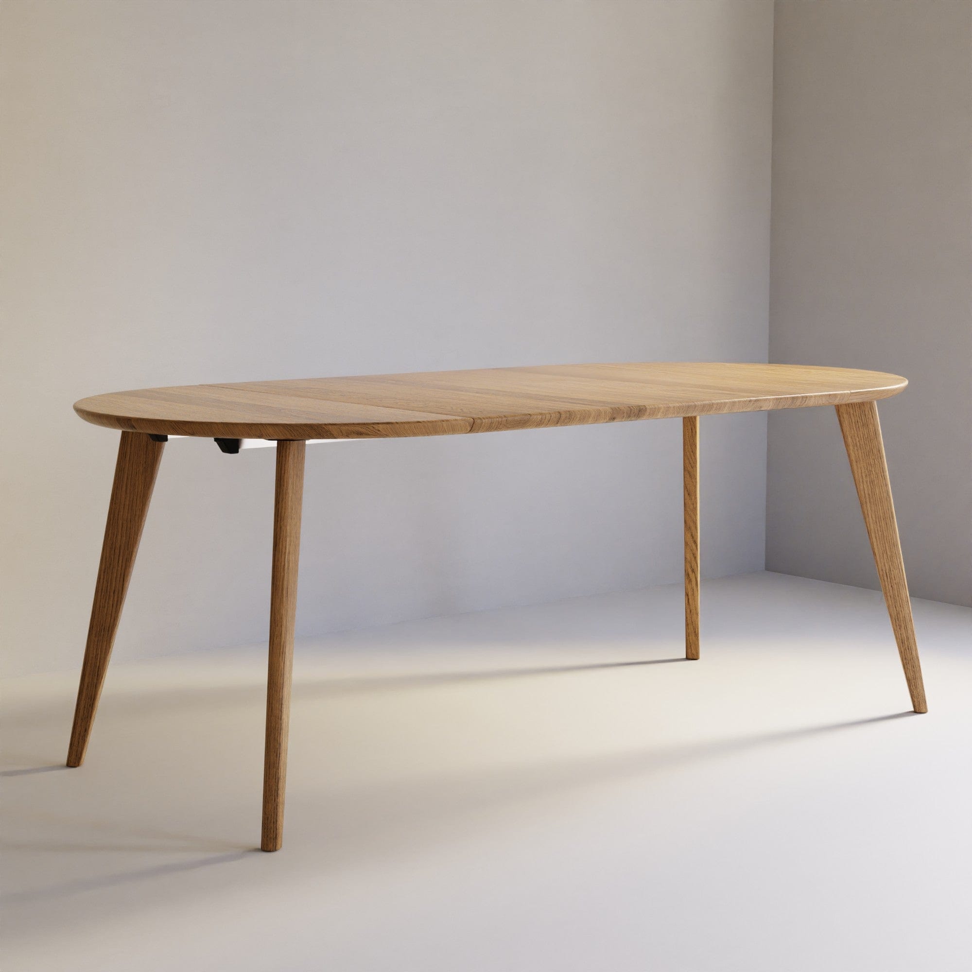 Mesa redonda extensible de roble macizo Prime, para 6-10 personas, borde suizo / Colección KANTAR
