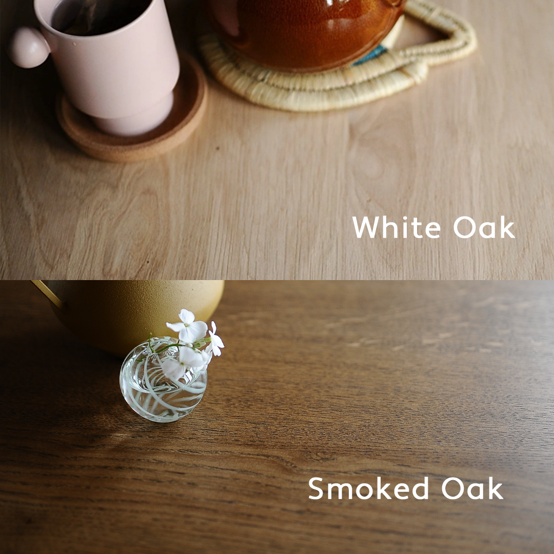 Two wooden surfaces labeled 'White Oak' and 'Smoked Oak' with a cup and vase on each.